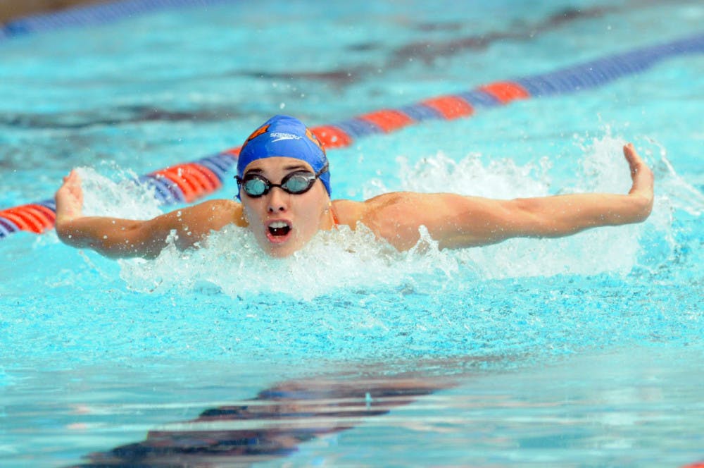 Georgia Marris races during Florida’s meet against Auburn on Jan. 23, 2016, in the O’Connell Center.