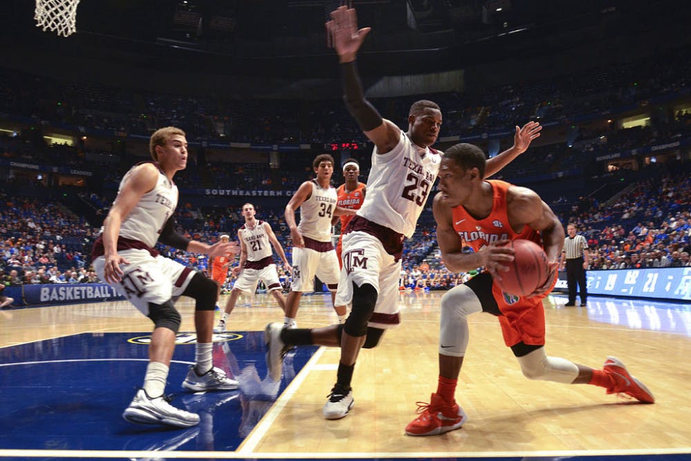 KeVaughn Allen looks to pass during Florida's 72-66 loss to Texas A&amp;M on March 11, 2016, in the SEC Tournament.