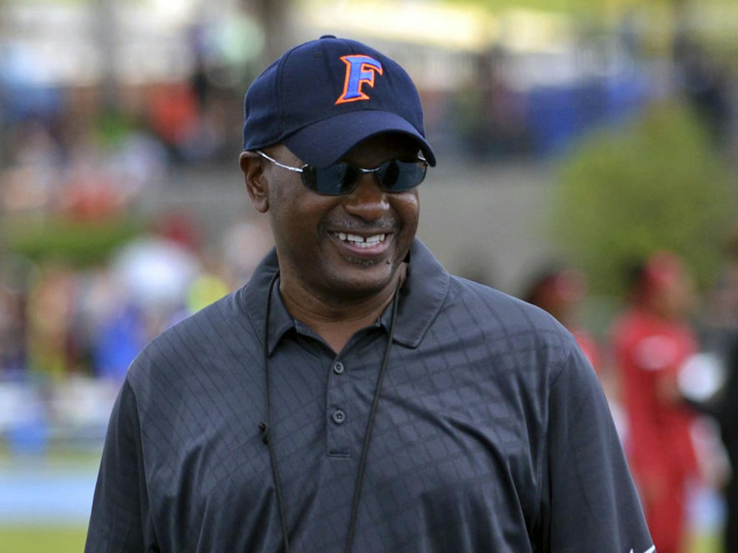 UF coach Mike Holloway smiles during the 2015 Florida Relays at James G. Pressly Stadium.