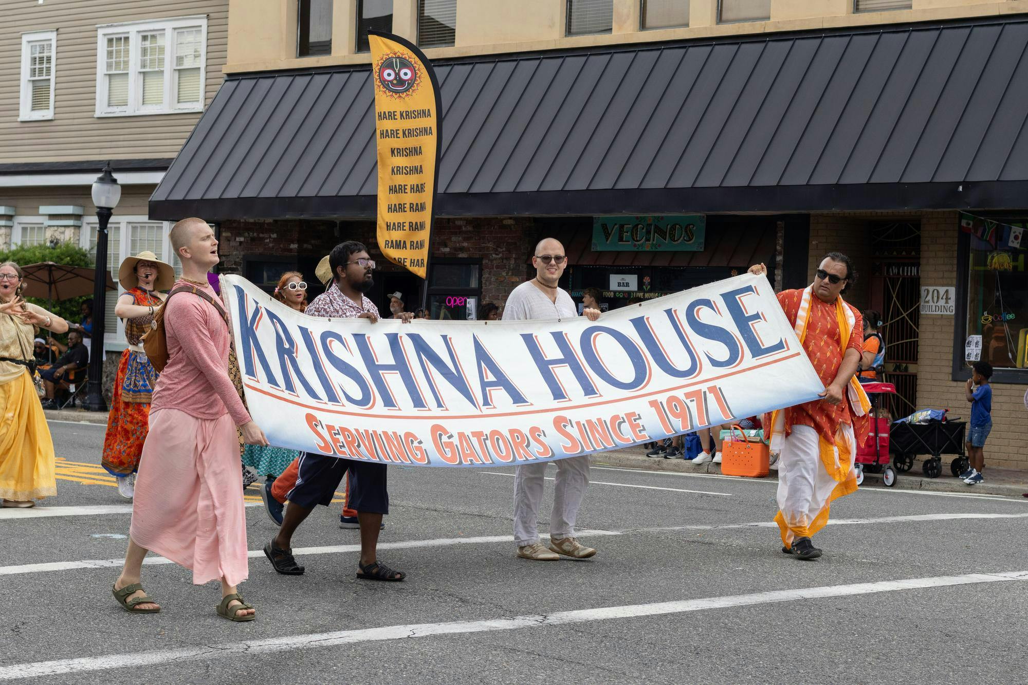 Members of the Krishna House participate in the Homecoming Parade, Friday, Oct. 9, 2026, in Gainesville, Fla.