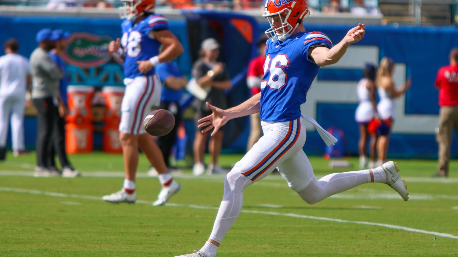 Punter Jeremy Crawshaw warms up before the Gators' game against the Georgia Bulldogs on Saturday, Oct. 28, 2023.