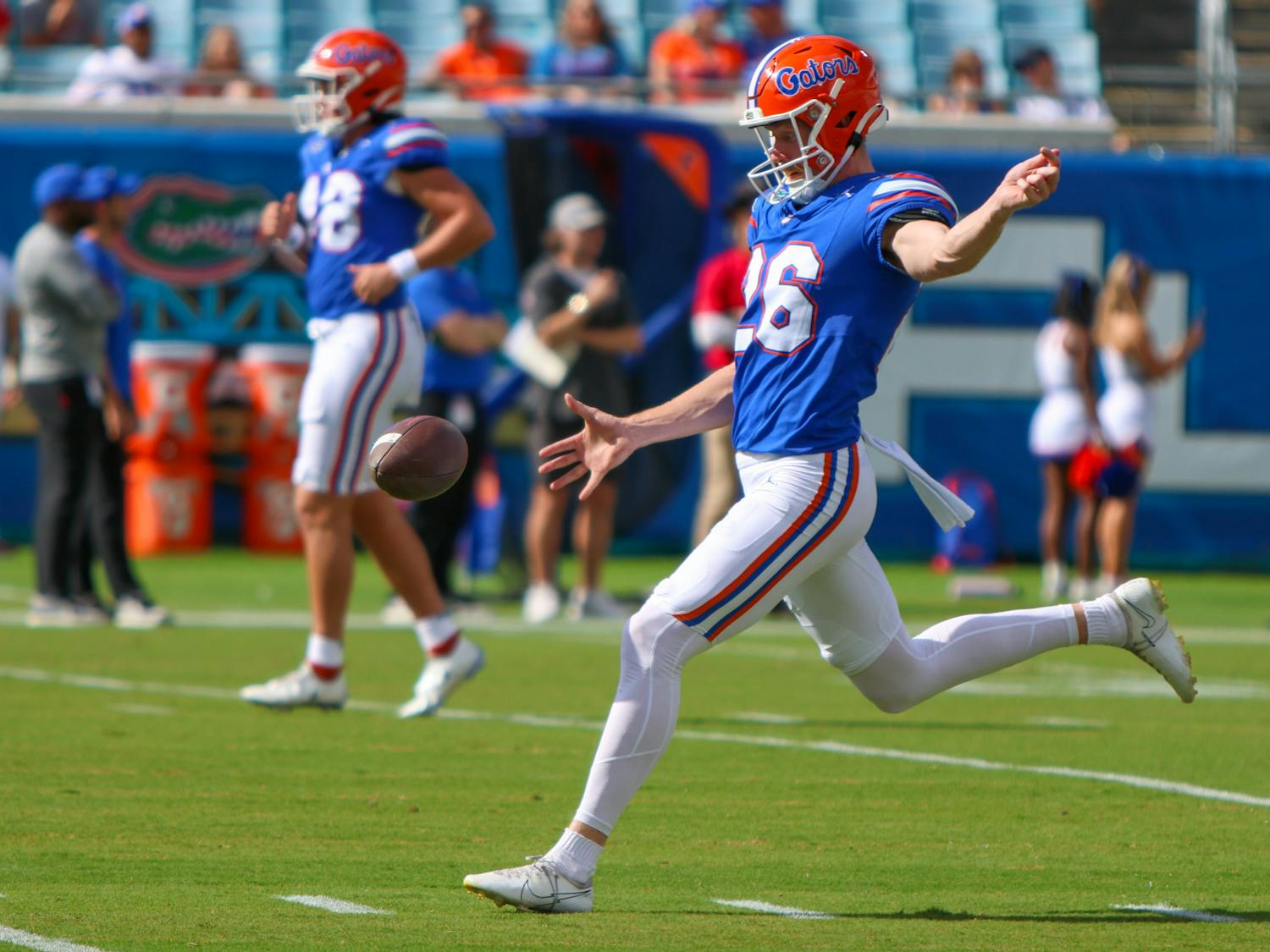 Punter Jeremy Crawshaw warms up before the Gators' game against the Georgia Bulldogs on Saturday, Oct. 28, 2023.