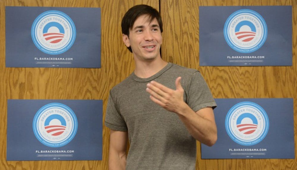 <p>Justin Long speaks at the Reitz Union in support of President Obama on Wednesday evening. Long encouraged students to educate themselves on candidates’ platforms, get registered to vote and cast their votes locally.</p>