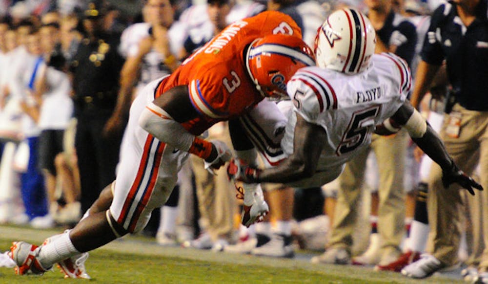 <p>Florida linebacker Jelani Jenkins (3) dropped a near interception against FAU on Saturday, and the Gators posted a minus-3 turnover margin despite handily beating the Owls 41-3.</p>