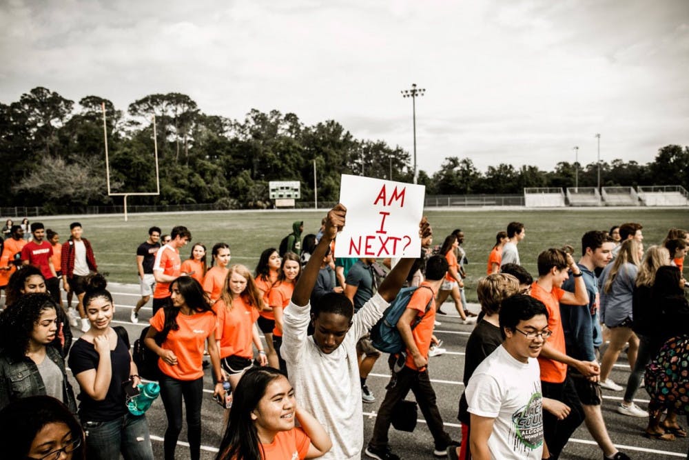 <p>Students at Eastside High School walkout of class in support of gun reform. </p>