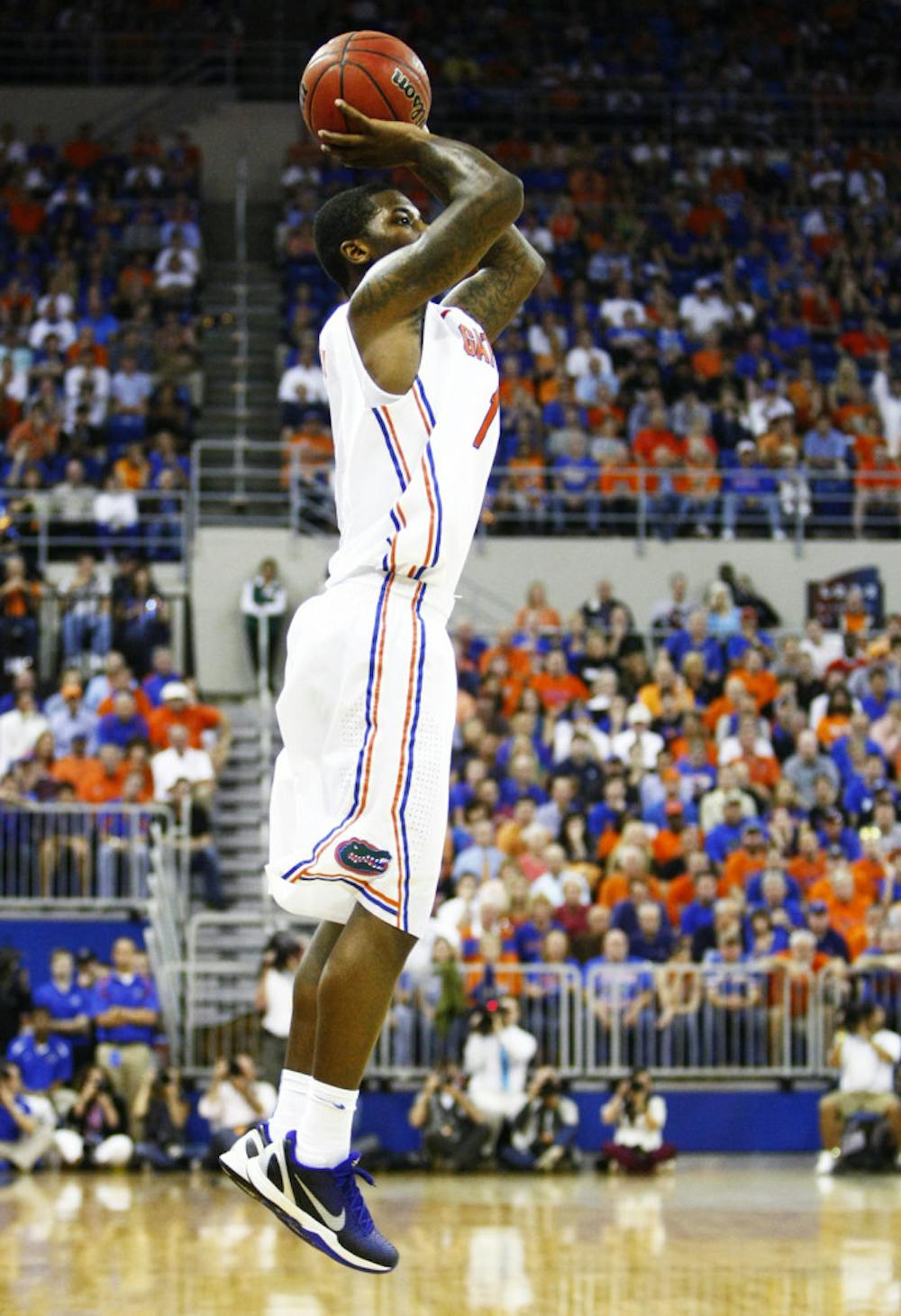 <p>Kenny Boynton attempts a shot during Florida’s 69-52 victory against Kentucky on Feb. 12 at the O’Connell Center.</p>