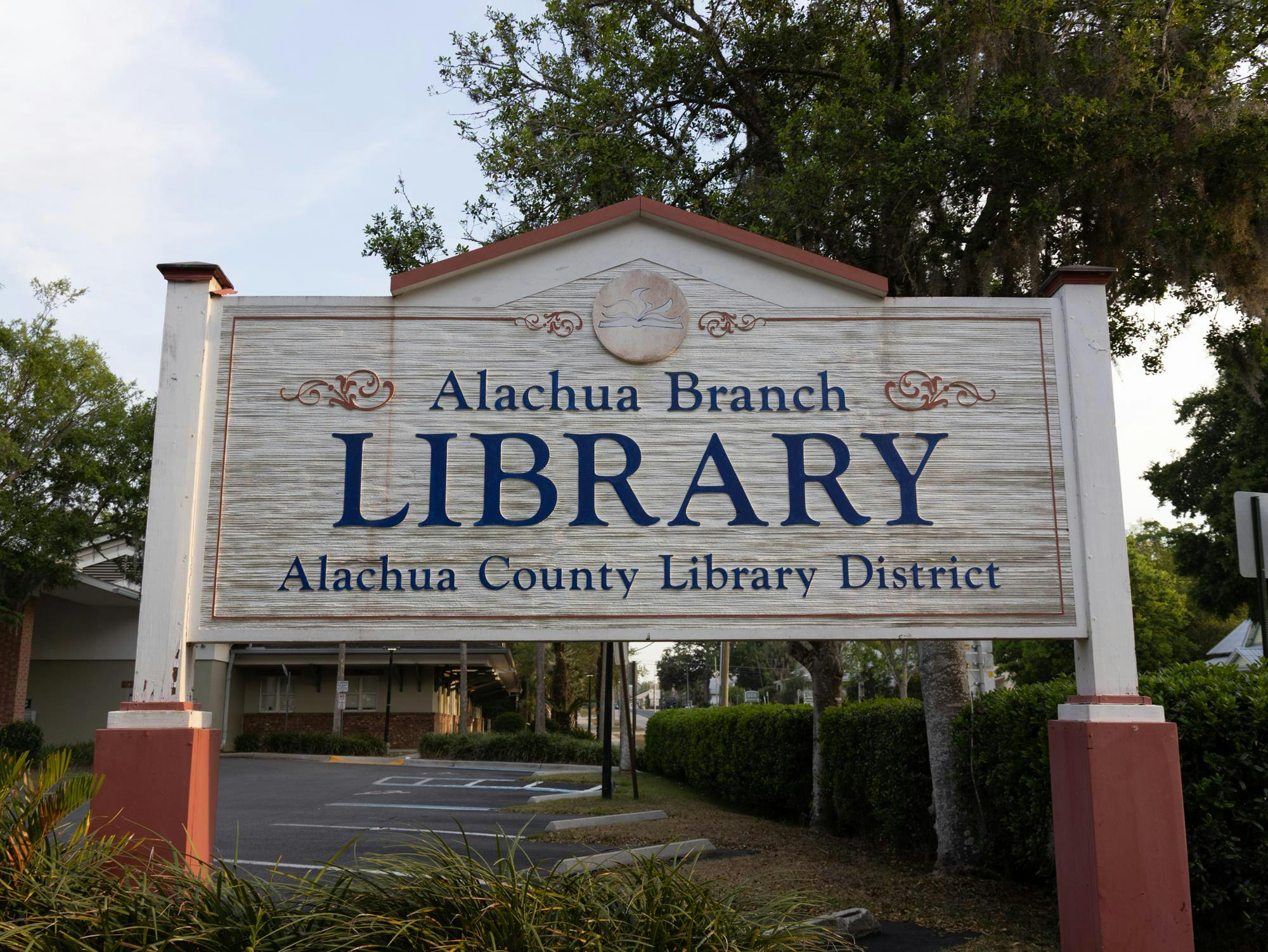 The sign for Alachua Branch Library stands on Northwest 140th Street, Tuesday, April 21, 2026, in Gainesville, Fla.