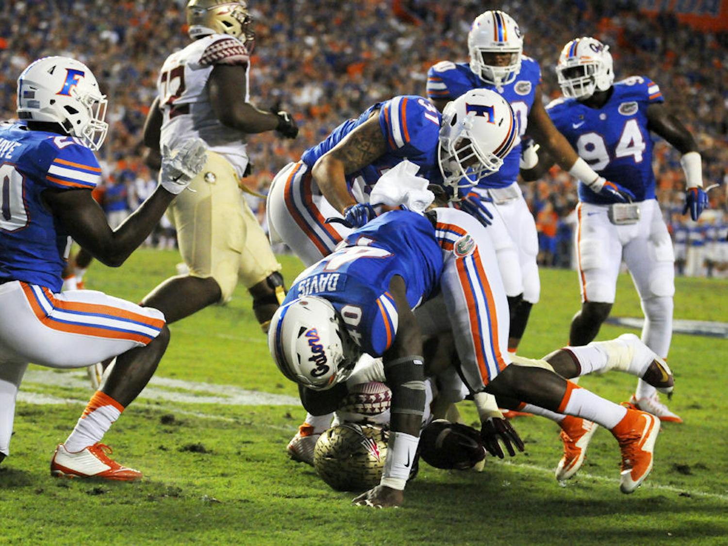 UF linebacker Jarrad Davis tackles Florida State running back Dalvin Cook during Florida's 27-2 loss on Nov. 28, 2015, at Ben Hill Griffin Stadium.