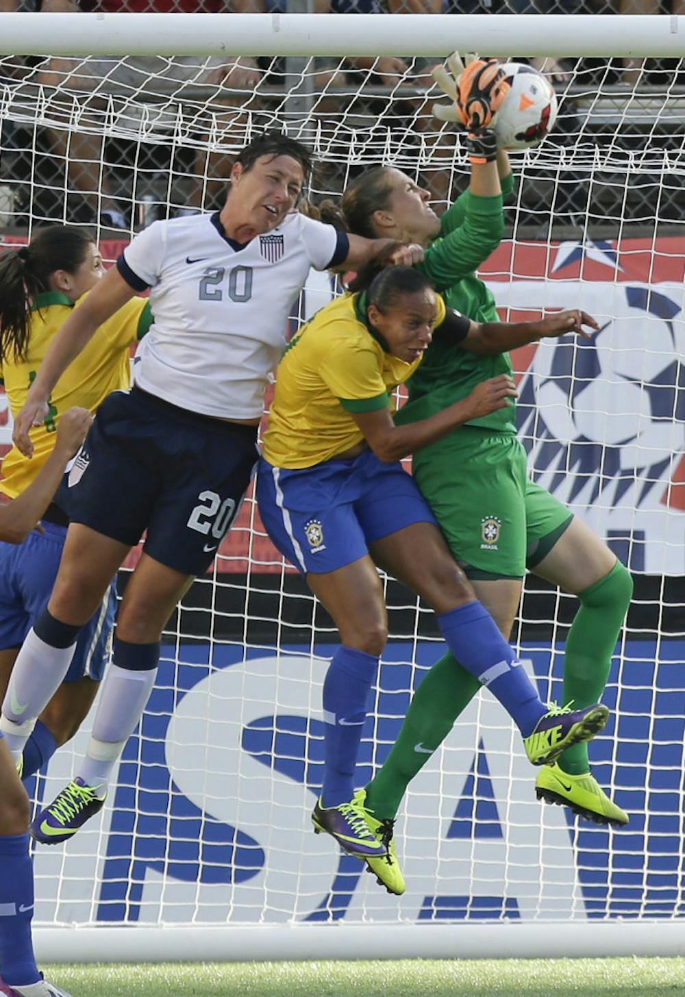 <p>U.S. forward Abby Wambach (20) tries to head the ball in the goal during the first half of an international friendly soccer match against Brazil in Orlando on Sunday.</p>