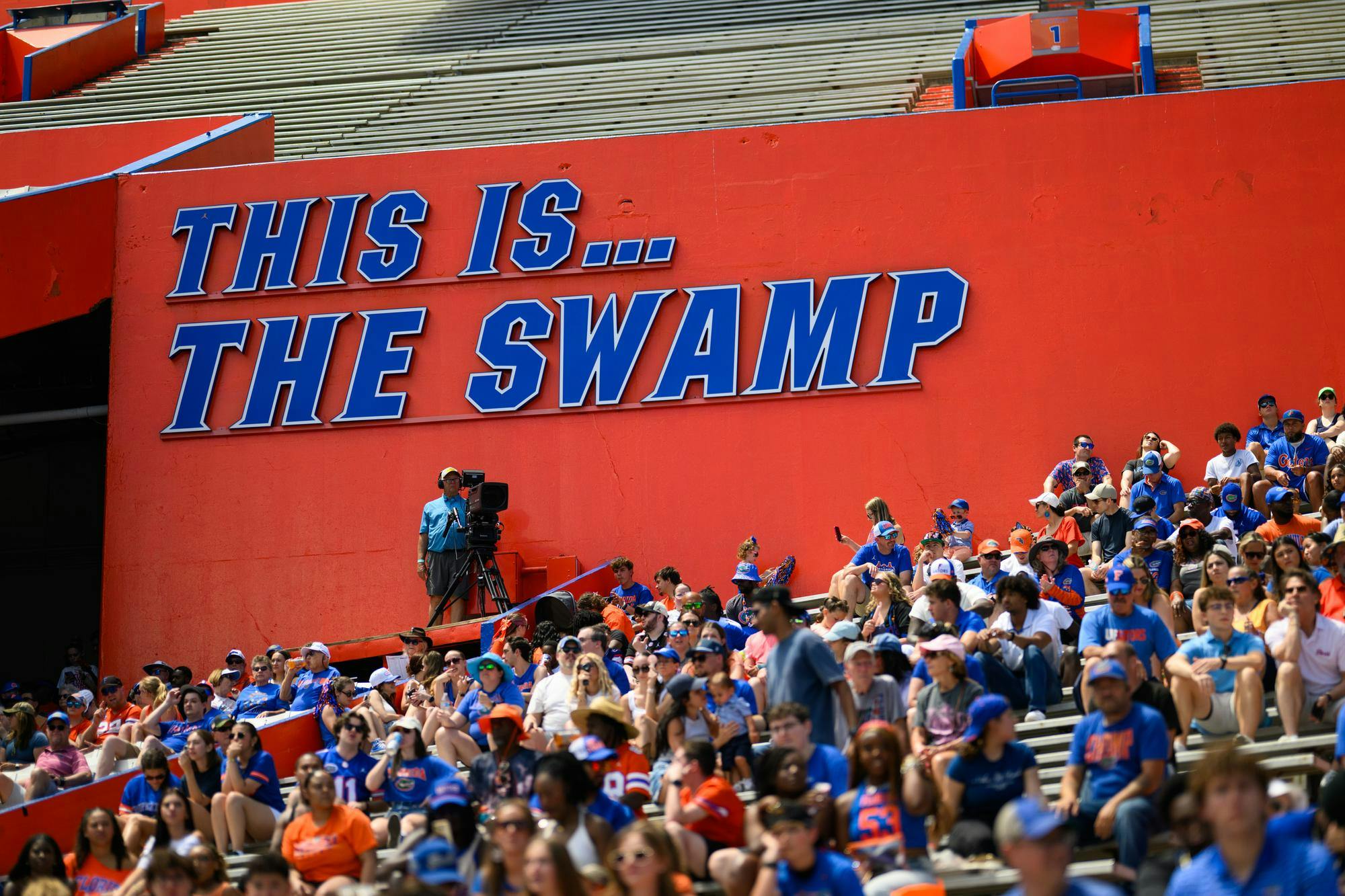 A sign reads “This is… The Swamp” inside Ben Hill Griffin Stadium.