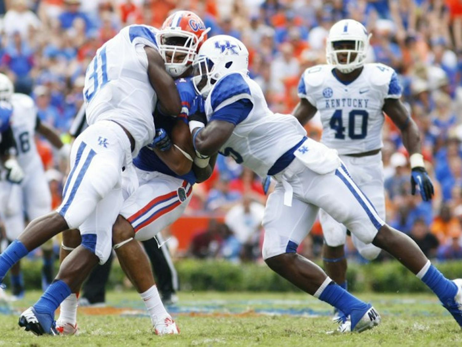 Red shirt junior tight end Jordan Reed takes a hard hit during Florida's 38-0 victory against Kentucky at Ben Hill Griffin Stadium on Saturday.