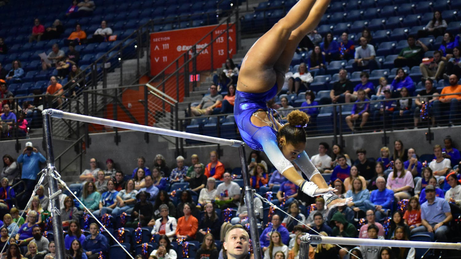 Junior Sloane Blakely performs on the uneven bars in the Gators gymnastics' Hype Night on Monday, Dec. 4, 2023.
