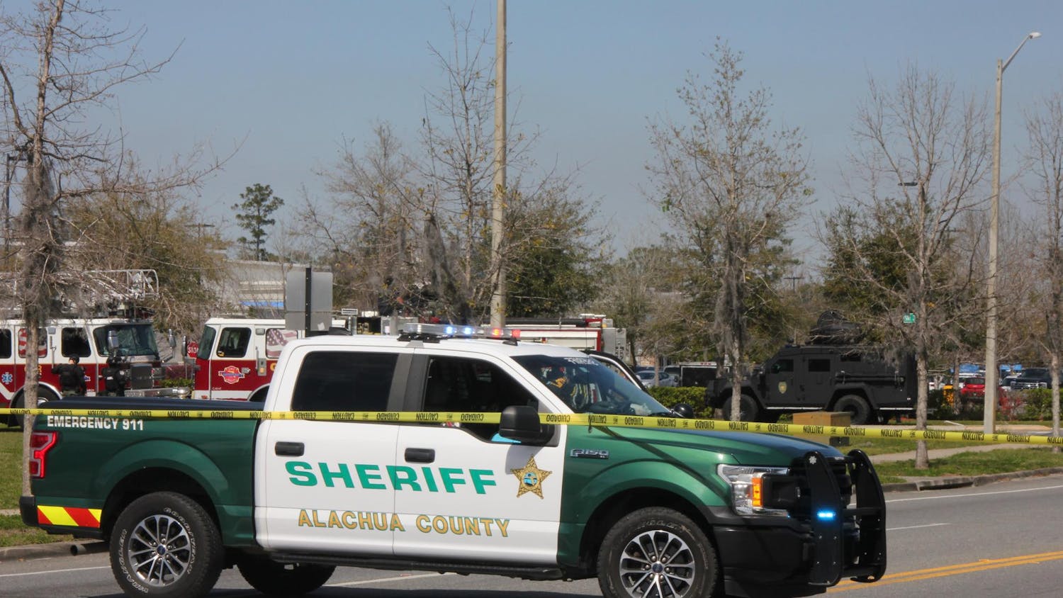 Local law enforcement arrested a woman who fired shots in the Butler Plaza Walmart parking lot Saturday after an hours-long standoff.
