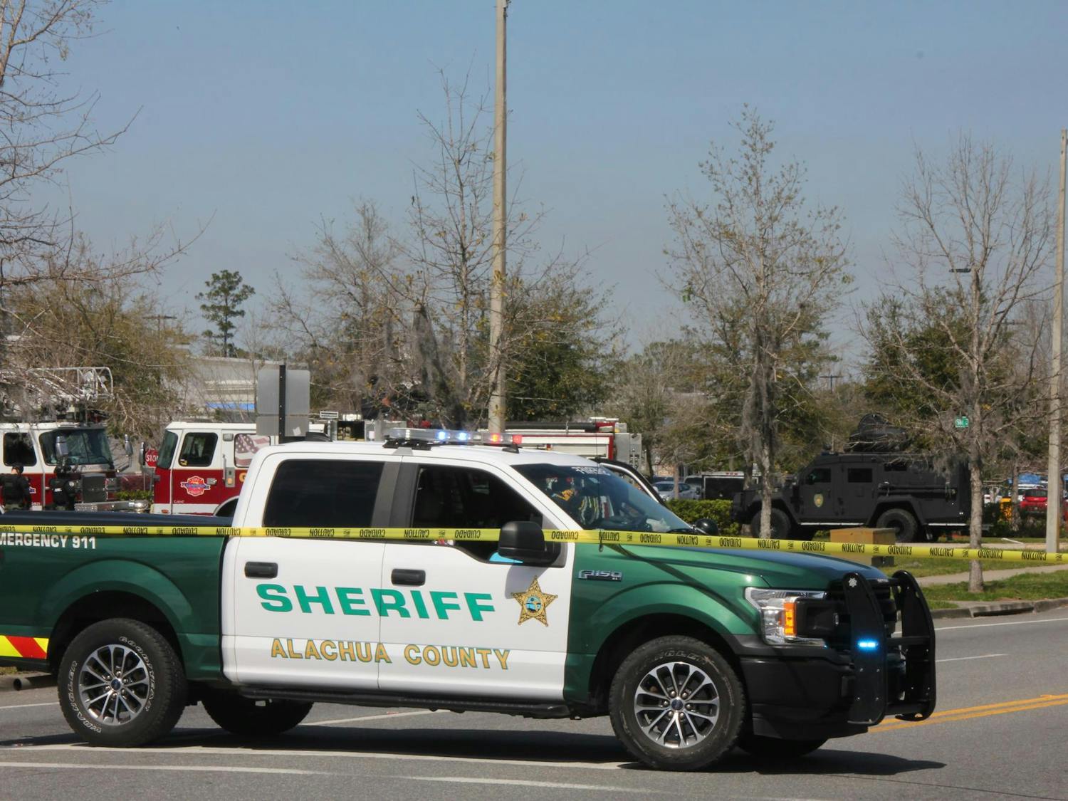 Local law enforcement arrested a woman who fired shots in the Butler Plaza Walmart parking lot Saturday after an hours-long standoff.
