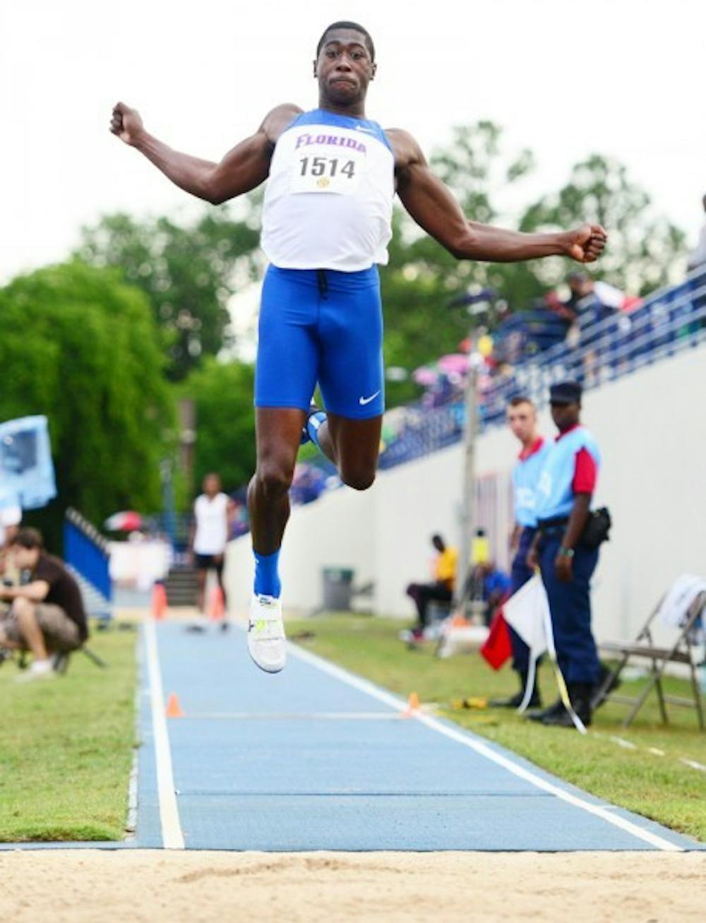 <p>Marquis Dendy competes in the triple jump at the the Tom Jones Memorial Classic on April 21, 2012.</p>