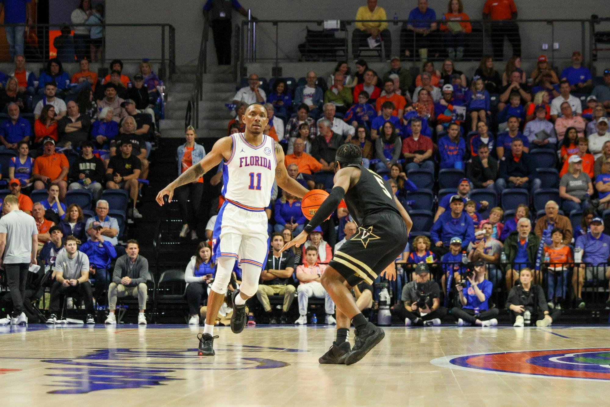 Guard Kyle Lofton dribbles the ball against the Vanderbilt Commodores in an 88-80 defeat Saturday, Feb. 11, 2023. 