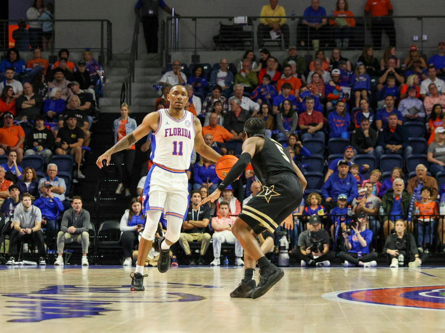Guard Kyle Lofton dribbles the ball against the Vanderbilt Commodores in an 88-80 defeat Saturday, Feb. 11, 2023. 