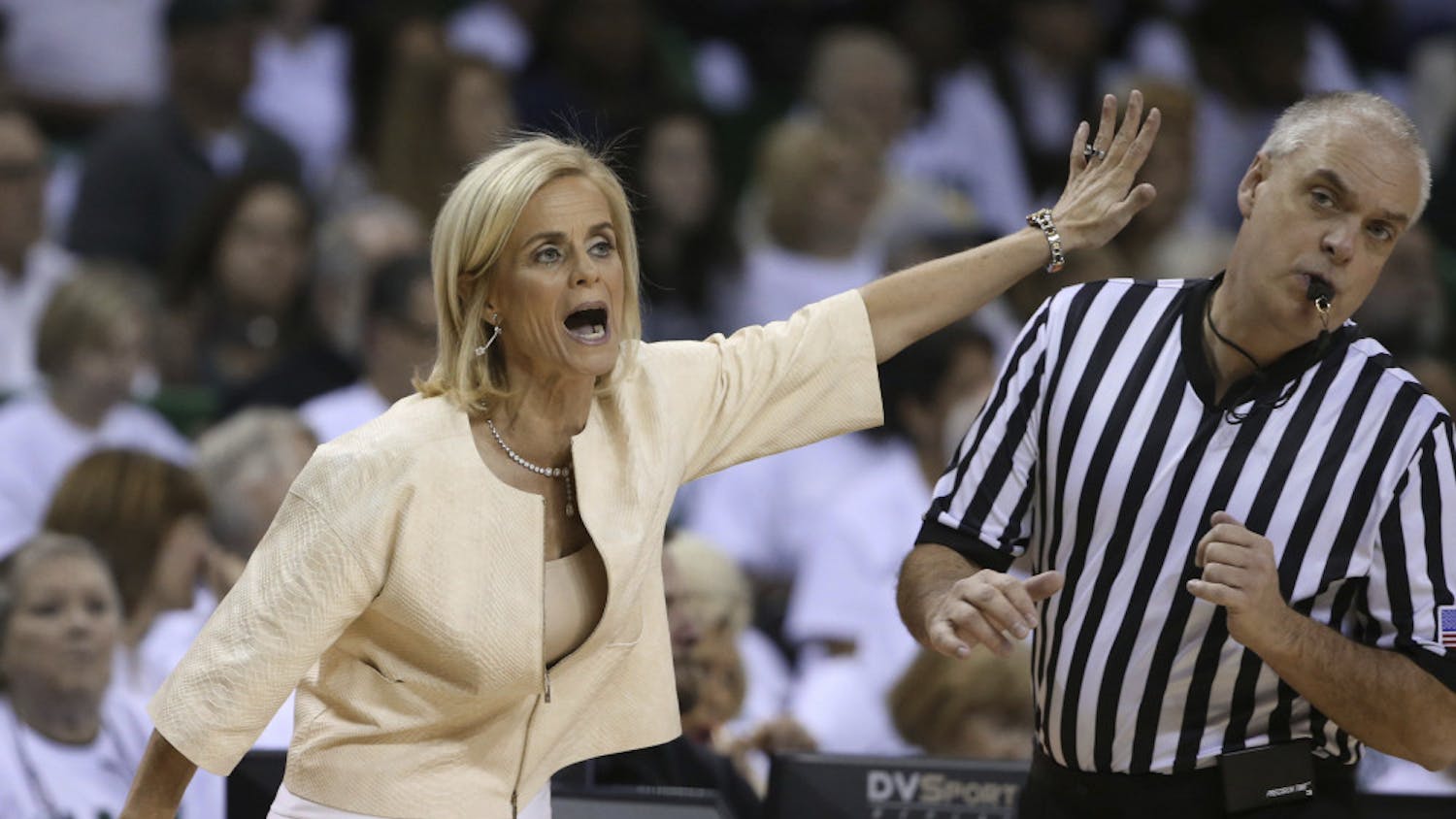 Baylor head women's coach Kim Mulkey calls in a play during the second half of an NCAA college basketball game against Texas Tech, Saturday, Feb. 25, 2017, in Waco, Texas. Baylor won 86-48. (AP Photo/Rod Aydelotte)