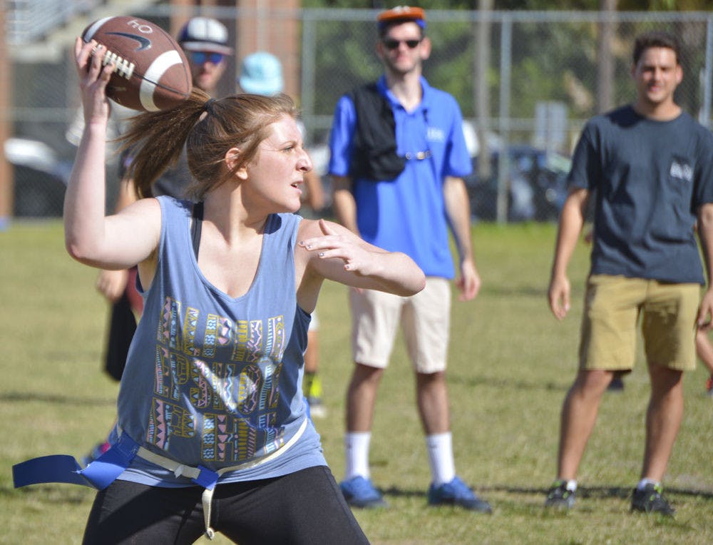 UF junior Ashey Rocque, 20, plays flag football with Alpha Epsilon Phi at Norman Field on Oct. 11, 2015. Alpha Epsilon Phi won 6-0 against Phi Mu. The sororities competed in the TEP Touchdown philanthropy event, which raised money for the American Cancer Society.