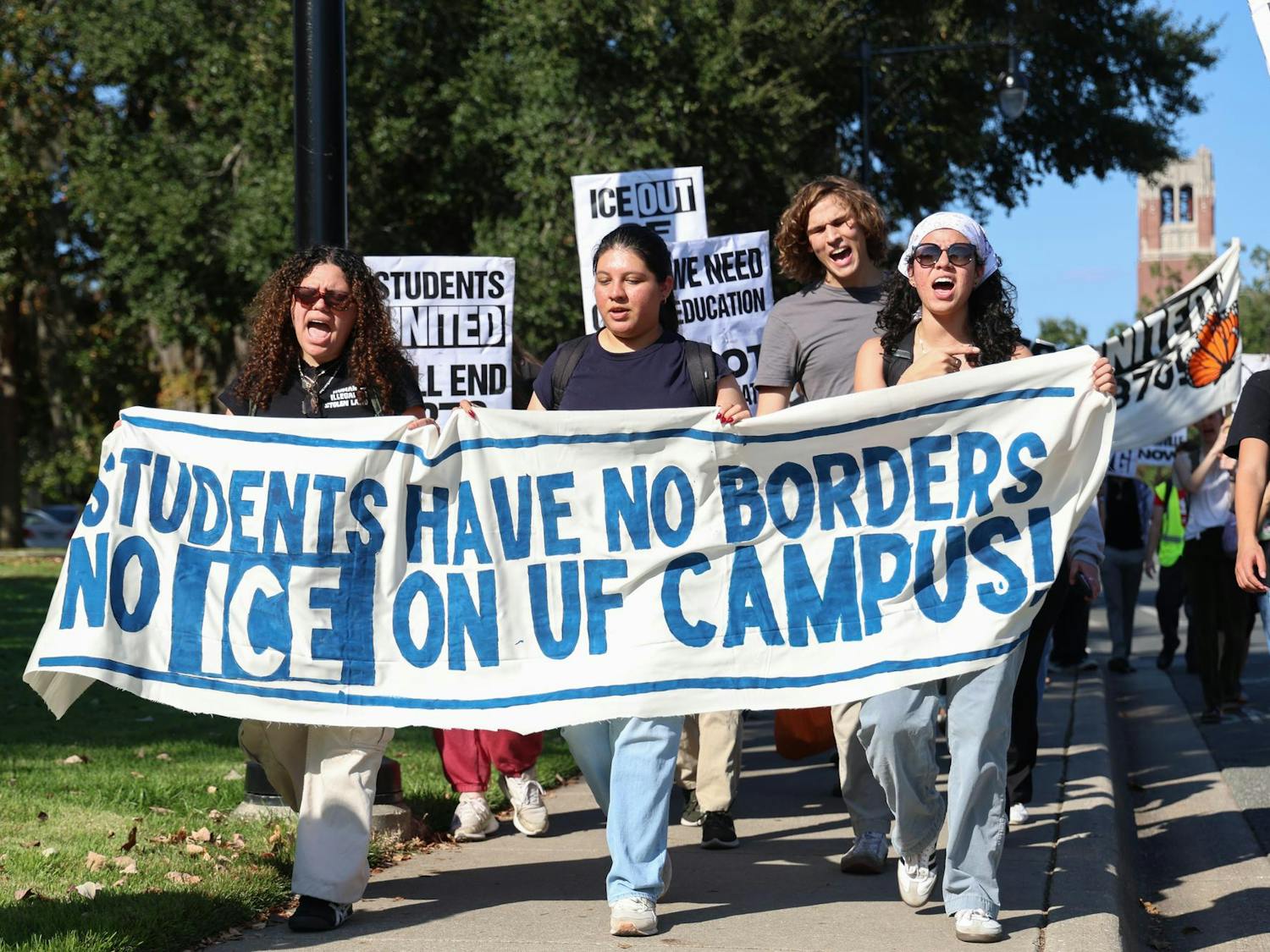 Students participate in a Students for Socialism at the University of Florida walkout to demand UFPD end its 287(g) agreement with ICE at Turlington Plaza, Thursday, Nov. 20, 2025.