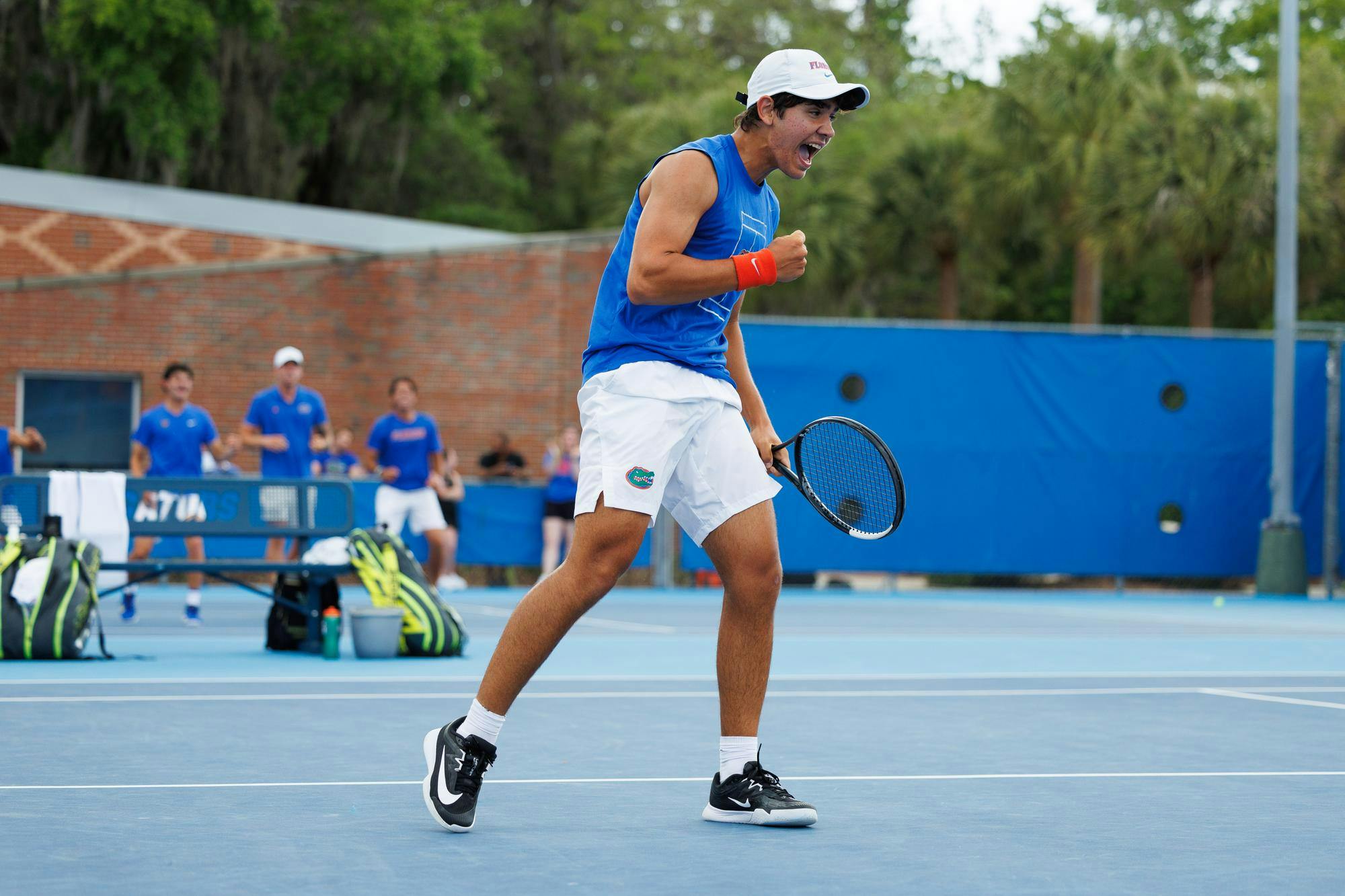 Florida tennis player Andreas Timini celebrates a point during an NCAA tennis match against Vanderbilt, Thursday, April 2, 2026, in Gainesville, Fla.