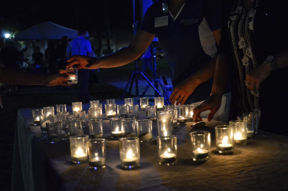 <p>During Take Back the Night, survivors of sexual assault spoke about their stories. For each of those who spoke, a candle was lit.</p>