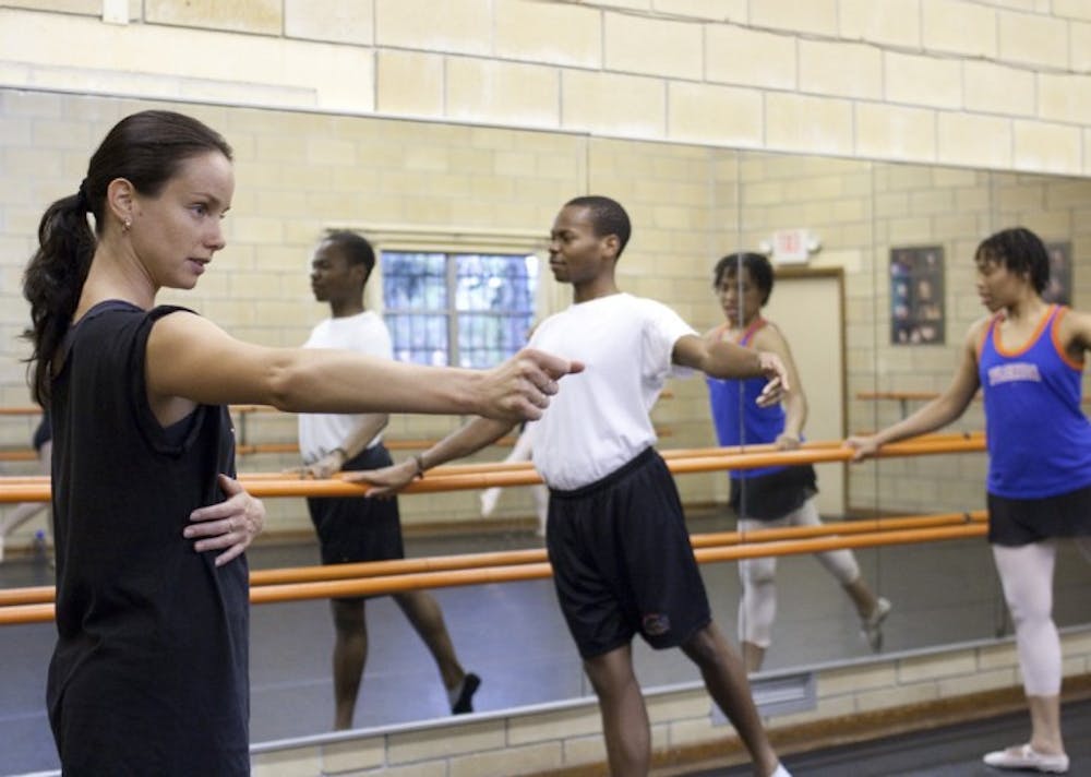 <p>Reka Gyulai, 25, a ballet instructor at Pofahl Studios, 1325 NW Second St., teaches the night class July 9</p>
