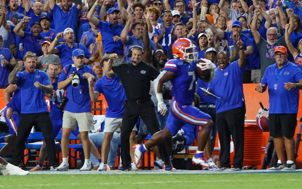 UF head coach Billy Napier celebrates as sophomore running back Trevor Etienne rushes for a 62 yard touchdown during the Gators 29-16 win over the Tennessee Volunteers Saturday, Sept. 16, 2023.