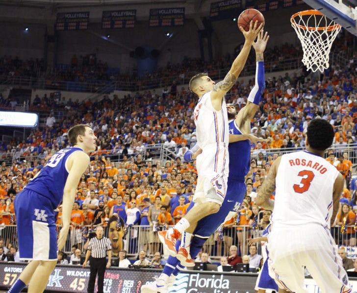 Junior guard Scottie Wilbekin attempts a layup during Florida’s 69-52 win against Kentucky on Feb. 12 in the O’Connell Center. Wilbekin said the Gators need to increase their offensive presence in the paint.
