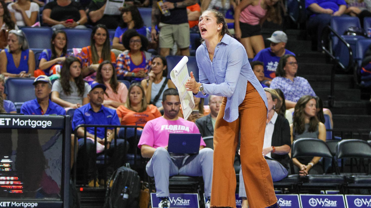 Volunteer assistant coach Caroline Knop calls out to the Florida volleyball team during its game against Louisiana State Saturday, Oct. 8, 2022. 