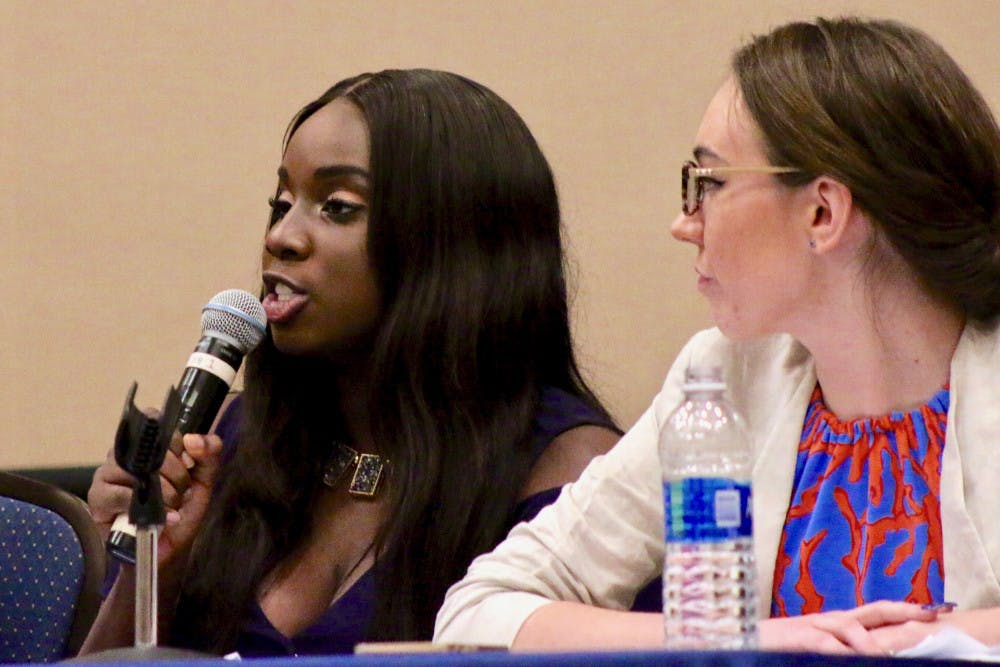 Challenge Party Student Government presidential candidate Janae Moodie responds to questions submitted by students during the debate on Tuesday. She spoke on feeling tokenized by the Impact Party during her time as an affiliate. 