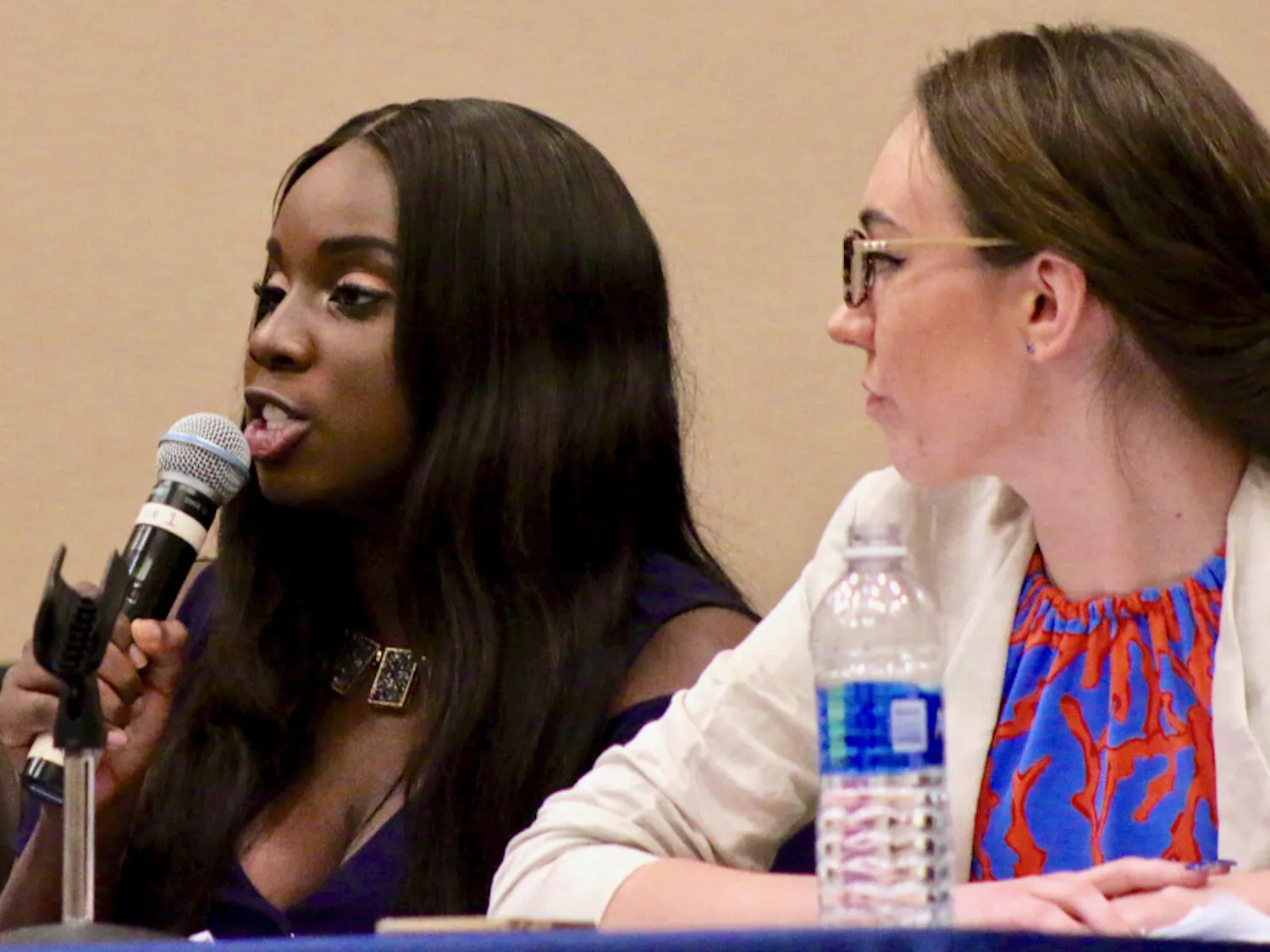 Challenge Party Student Government presidential candidate Janae Moodie responds to questions submitted by students during the debate on Tuesday. She spoke on feeling tokenized by the Impact Party during her time as an affiliate.