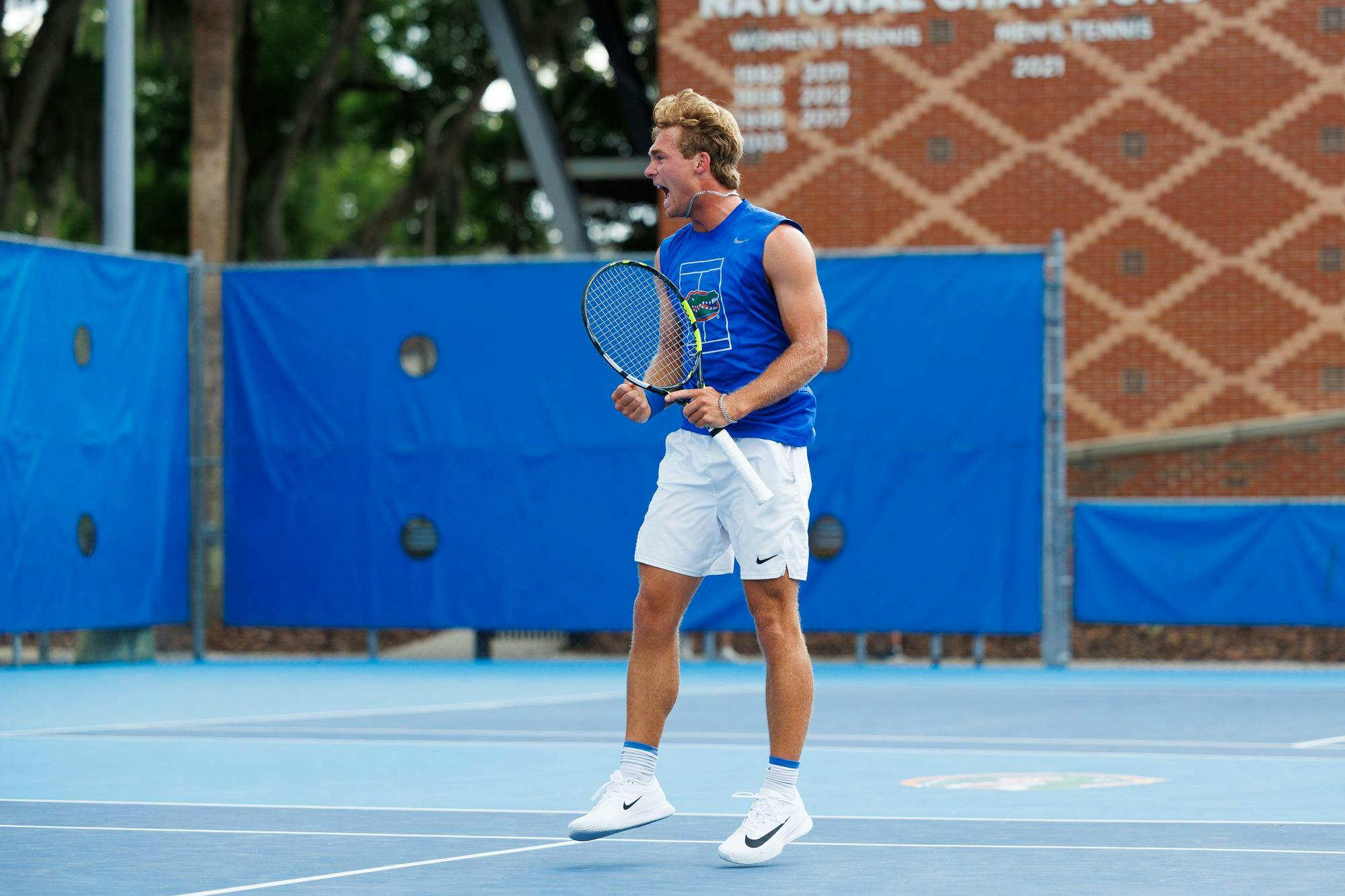 Florida tennis player Kevin Edengren screams in celebration during an NCAA tennis match against Vanderbilt, Thursday, April 2, 2026, in Gainesville, Fla.