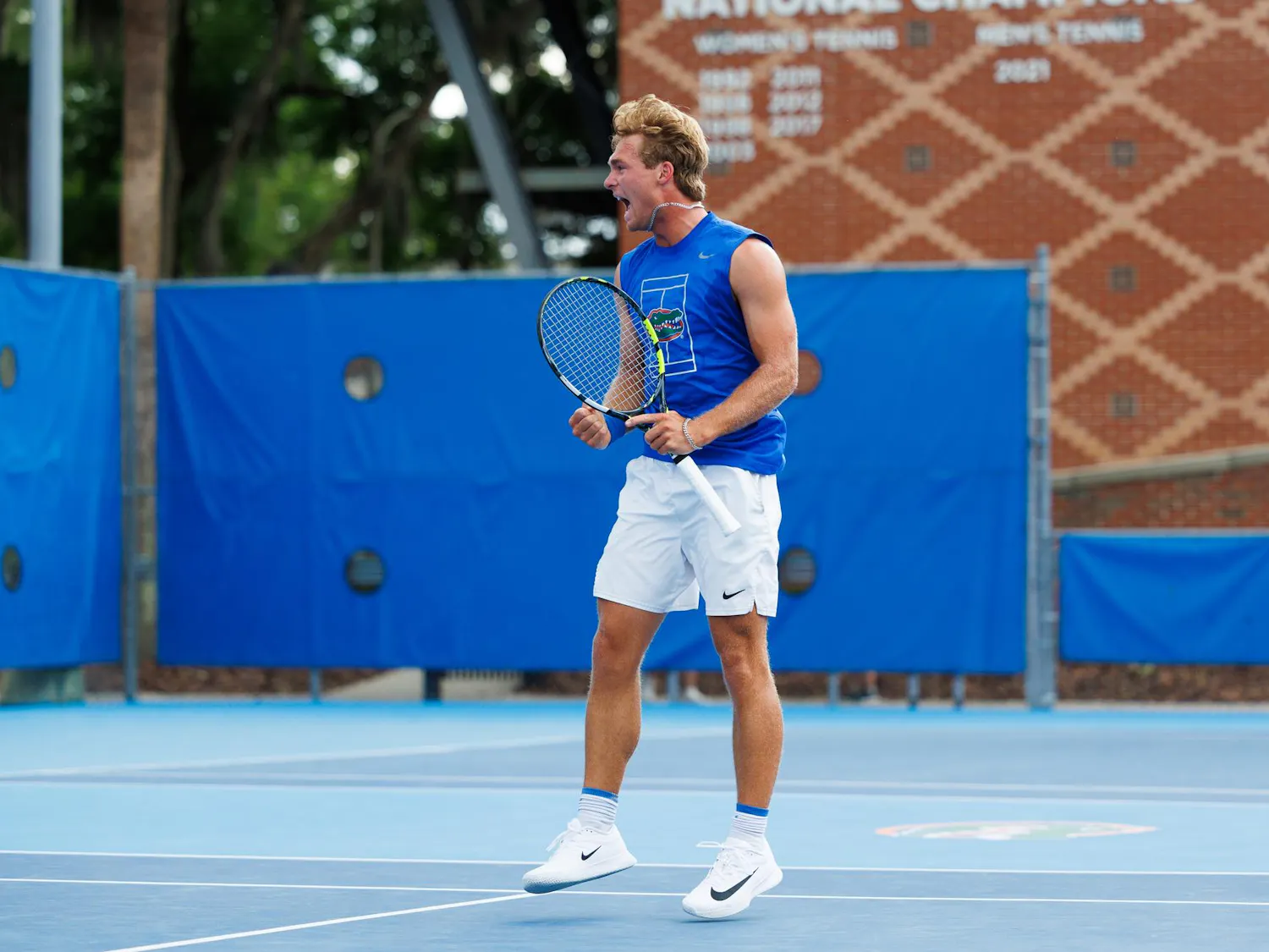 Florida tennis player Kevin Edengren screams in celebration during an NCAA tennis match against Vanderbilt, Thursday, April 2, 2026, in Gainesville, Fla.