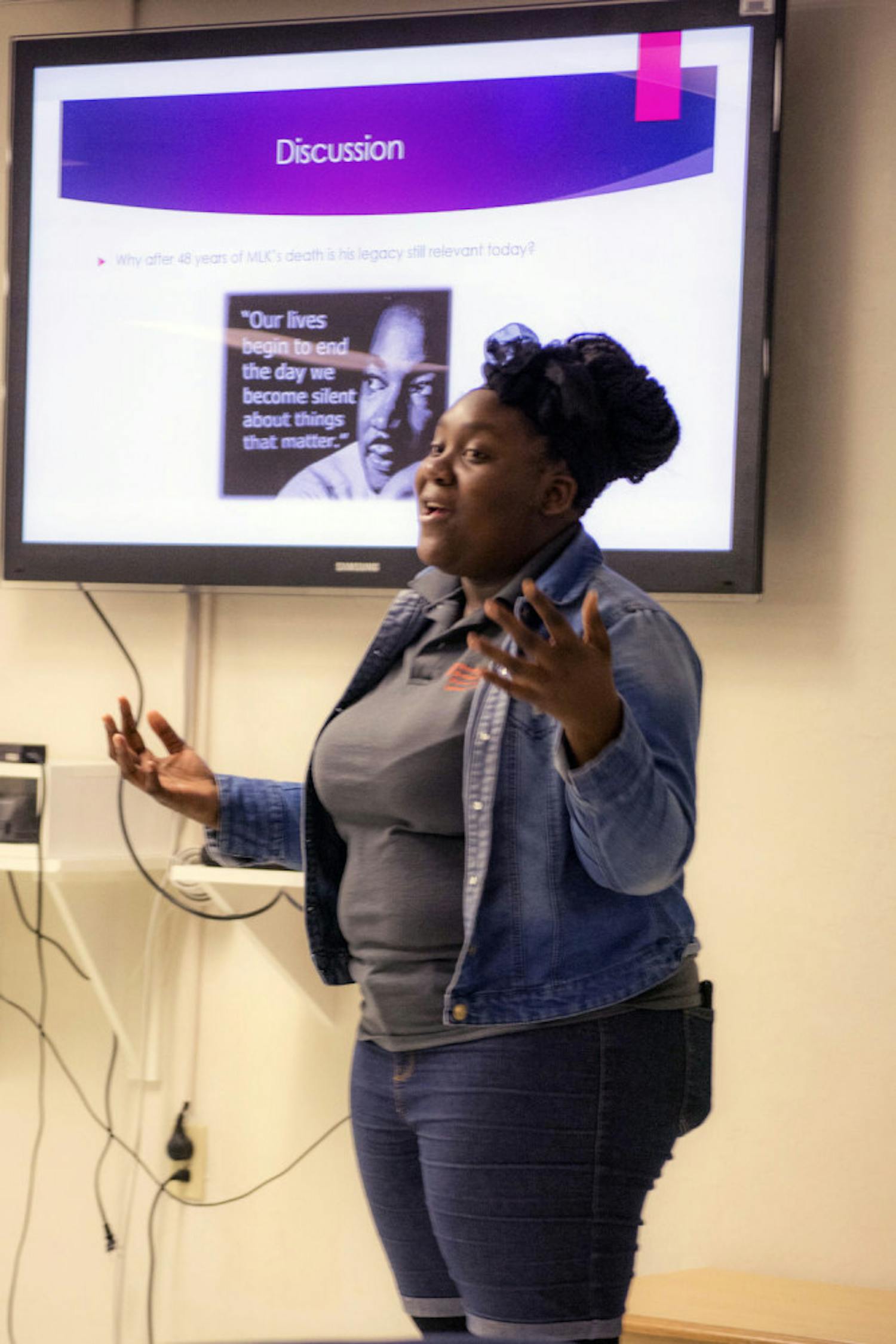 Brittany Isidore, a 20-year-old UF animal sciences sophomore, facilitates a discussion at “Remember MLK: Releasing Injustices” in the Yulee recreation room on Tuesday.