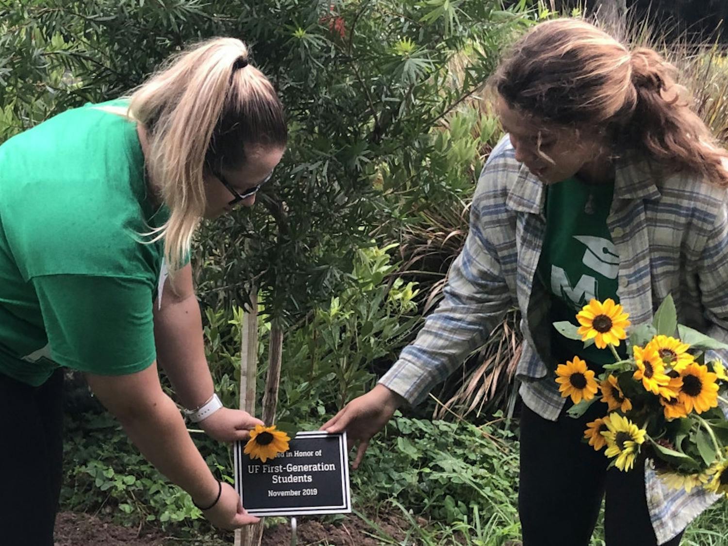 A garden was planted at the Field & Fork Pantry on Friday in honor of National First-Generation Day.