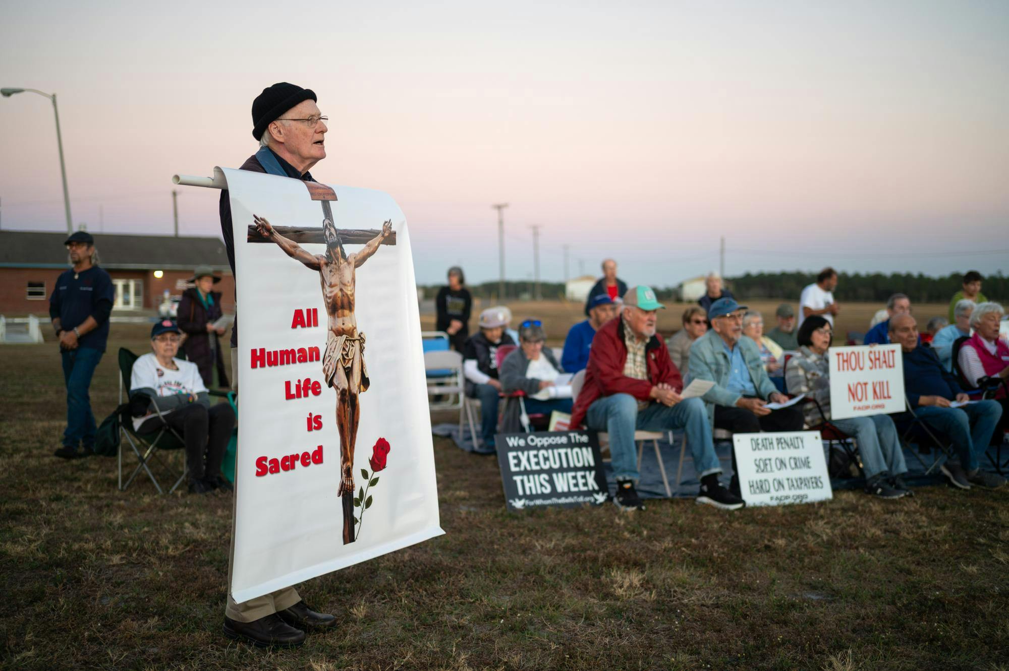 Protestors of the death penalty sit outside Florida State Prison in opposition to the execution of Bryan Frederick Jennings. Jennings was executed in Raiford on Thursday, Nov. 13, 2025.