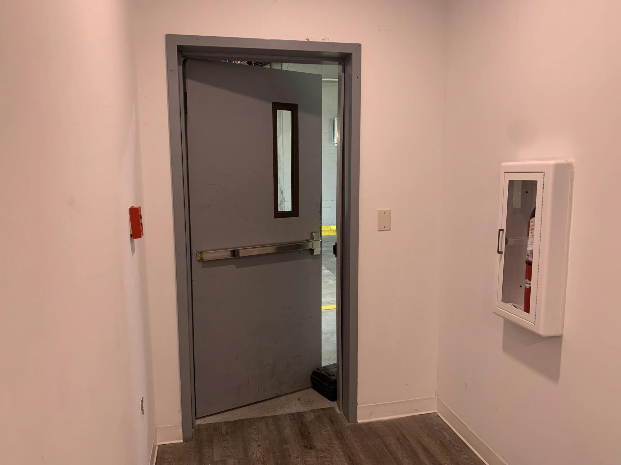 Midtown Apartment residents said propped doors, like the one pictured above July 27, 2022 contribute to the security breaches seen in the complex recently.