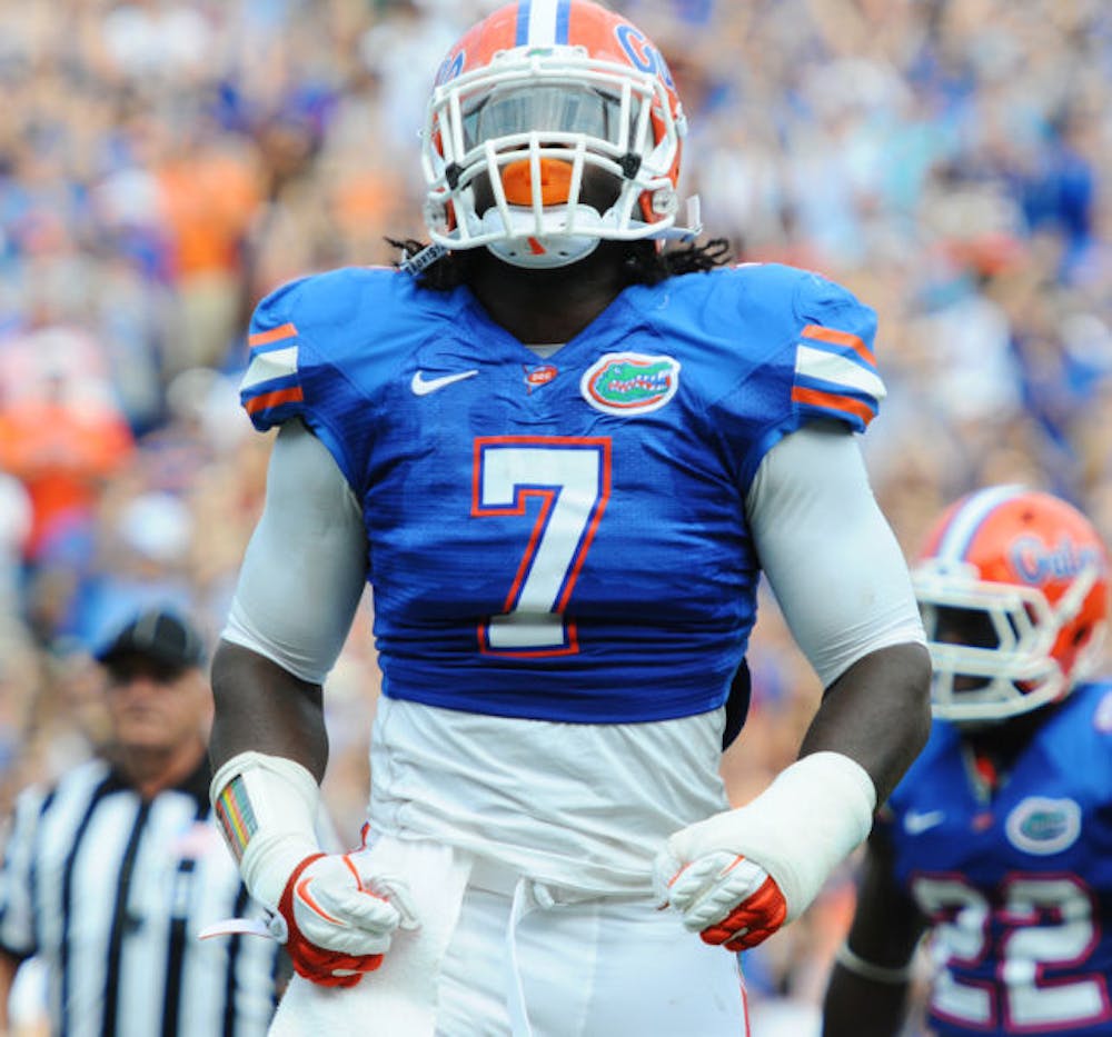 <p>Ronald Powell looks up at the crowd during Florida’s 33-23 win against Tennessee on Saturday, Sept. 17, 2011, in Ben Hill Griffin Stadium. Powell is ready to return to the UF defense after missing the entire 2012 season with a torn ACL suffered in the Orange and Blue Game.</p>