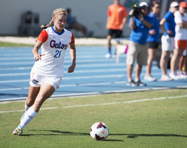 Jillian Graff dribbles the ball during Florida’s 3-0 victory against Auburn on Oct. 6 at James G. Pressly Stadium. The junior lost her father to lung cancer in 2012 but fights on in his memory.