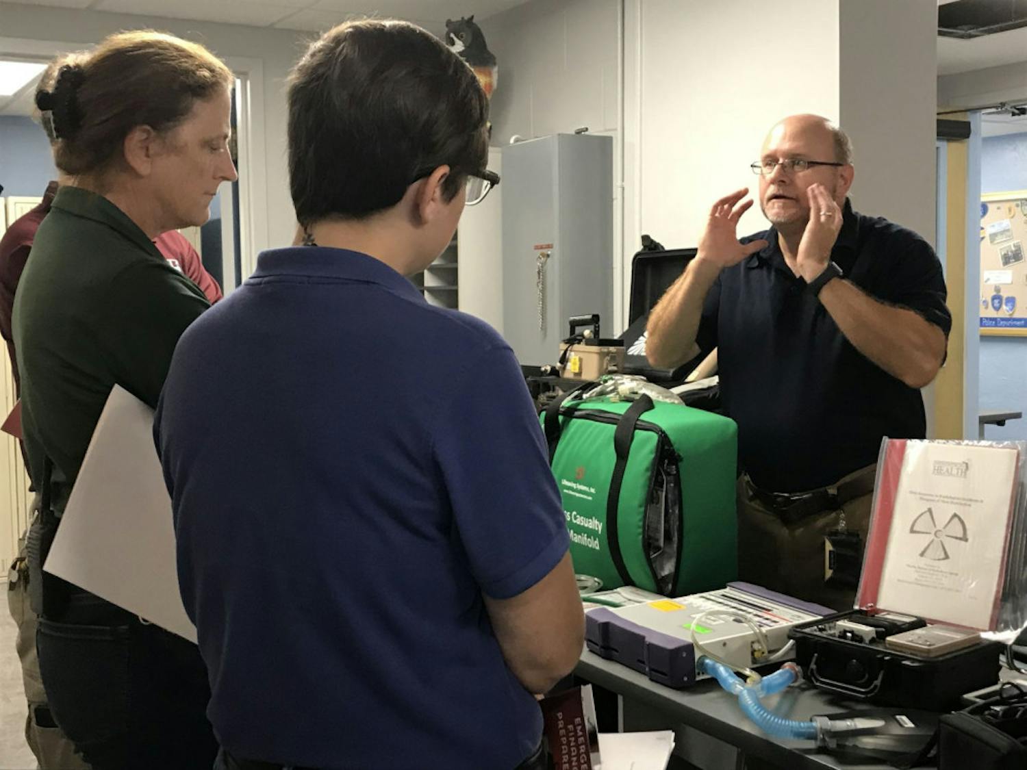Florida Health representative Robert Linnens teaches attendees about mobile ventilators. The ventilator, a gray and purple box in front of him, was connected to an oxygen tank and an airbag mimicking lungs.
&nbsp;