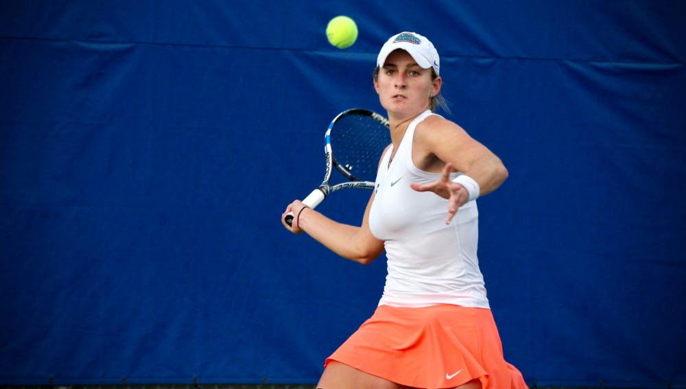 <p>Kourtney Keegan prepares to hit a forehand during Florida's 4-2 win against Oklahoma State on Feb. 18, 2017, at the Ring Tennis Complex.</p>