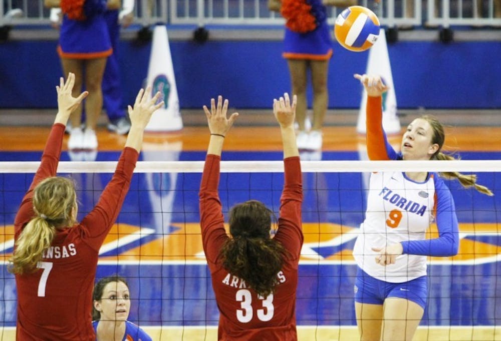 <p>Outside hitter Ziva Recek attempts to hit the ball over the net in Florida's 3-0 win on Friday in the Stephen C. O'Connell Center. Recek led UF with 19 kills against the Razorbacks.</p>