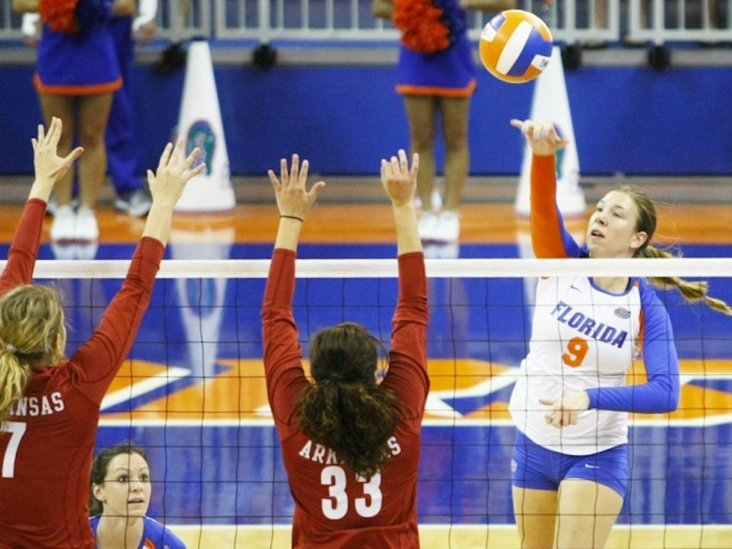 Outside hitter Ziva Recek attempts to hit the ball over the net in Florida's 3-0 win on Friday in the Stephen C. O'Connell Center. Recek led UF with 19 kills against the Razorbacks.