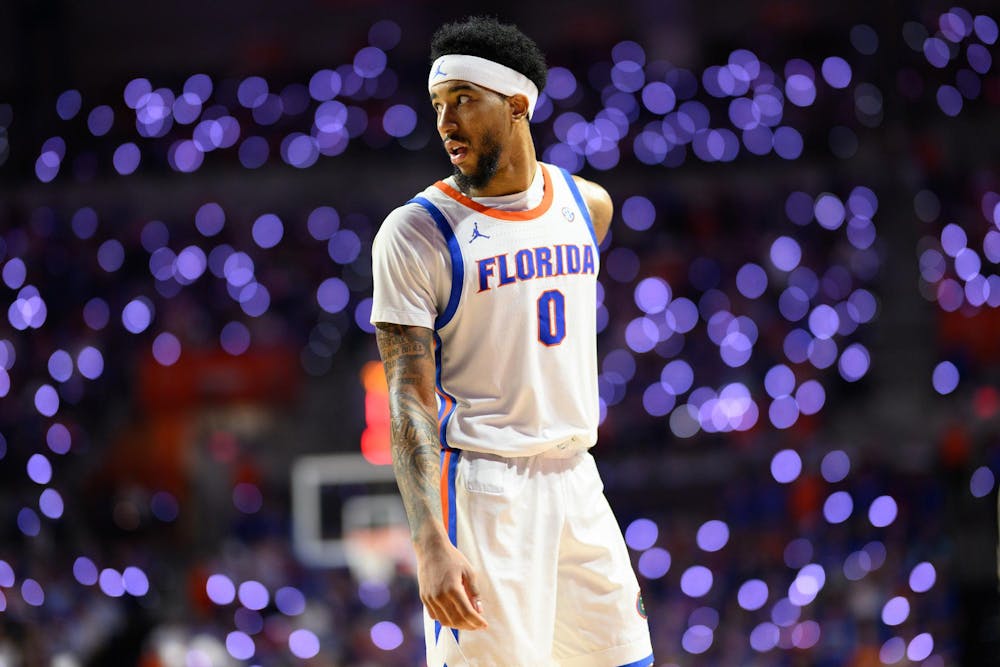 Florida guard Boogie Fland during a mid-game light show during a basketball game against Auburn, Saturday, Jan. 24, 2026, in Gainesville, Fla.