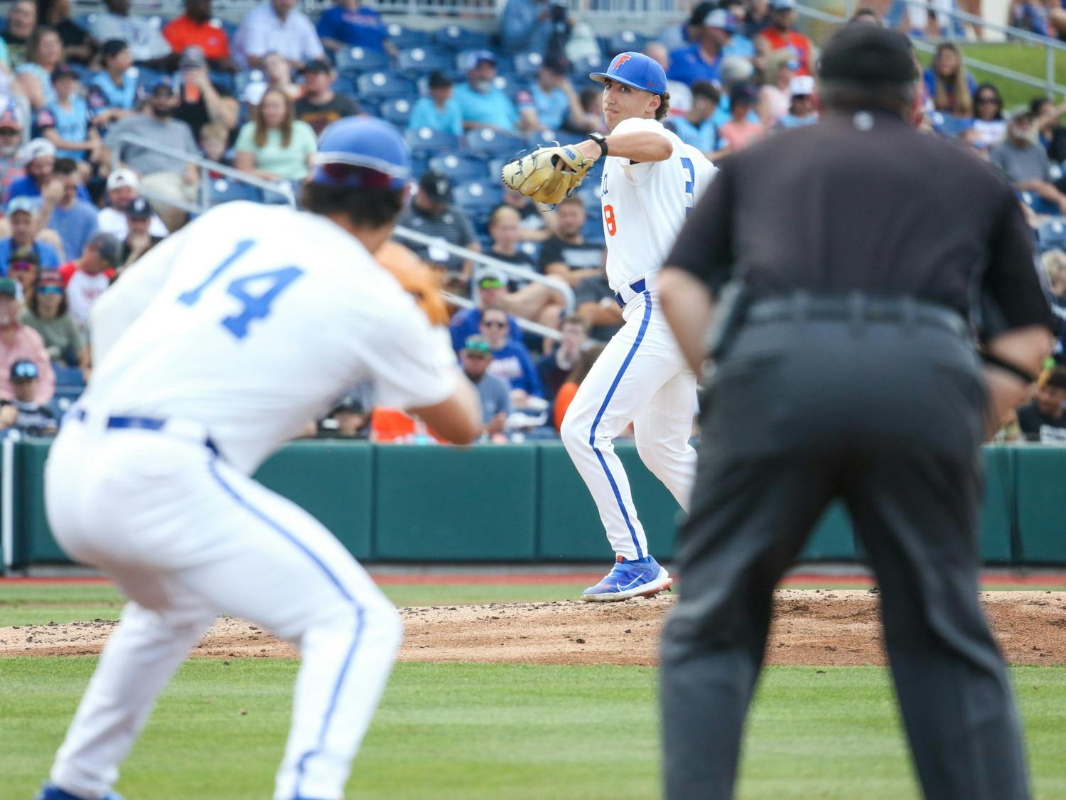 Florida pitcher Brandon Sproat throws the ball to first baseman Jac Caglianone during the Gators' 10-0 win against Vanderbilt Friday, May 12, 2023.