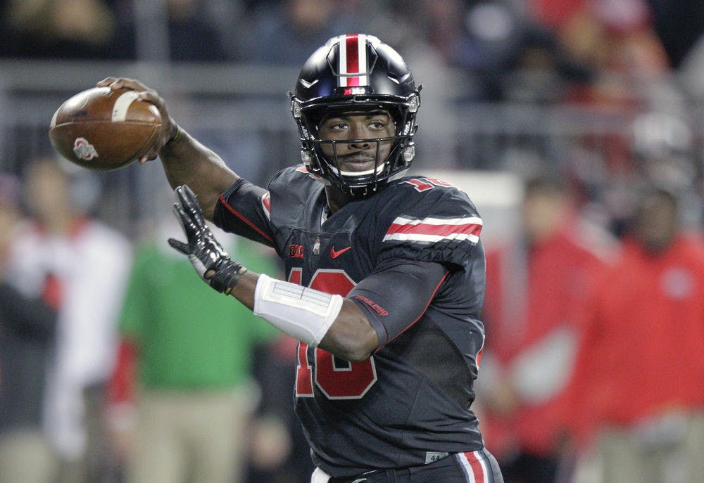 Ohio State quarterback J.T. Barrett drops back to pass against Penn State during the second half of the Buckeyes' 38-10 win on Oct. 17, 2015, at Ohio Stadium.