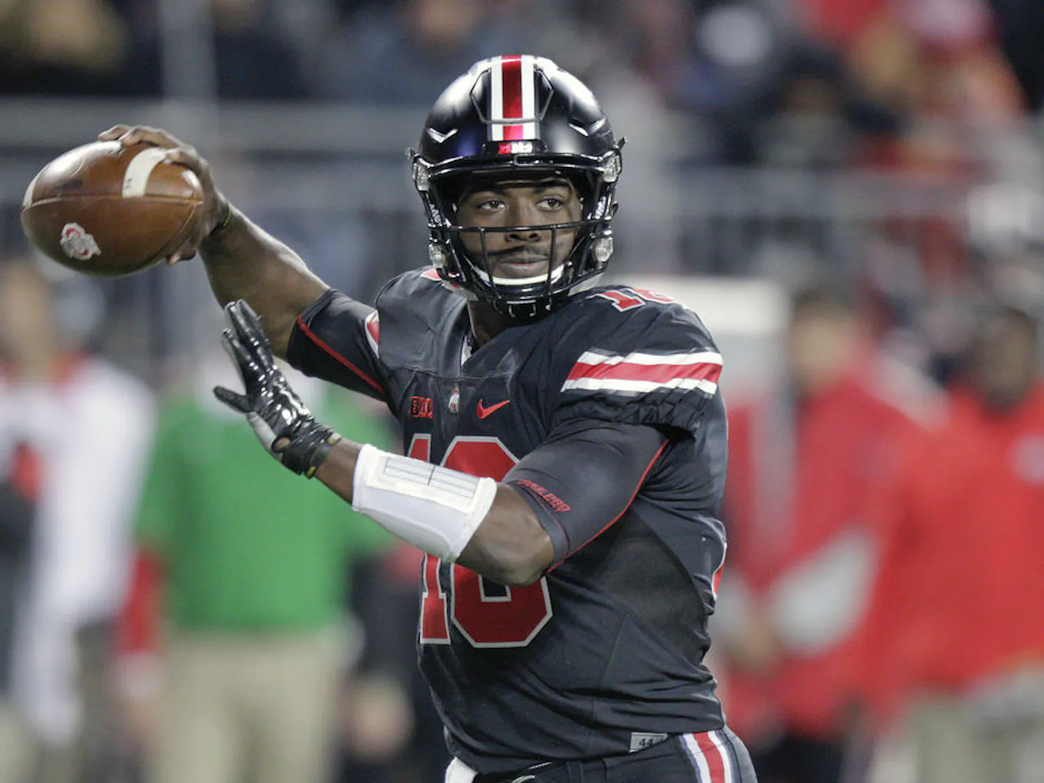 Ohio State quarterback J.T. Barrett drops back to pass against Penn State during the second half of the Buckeyes' 38-10 win on Oct. 17, 2015, at Ohio Stadium.
