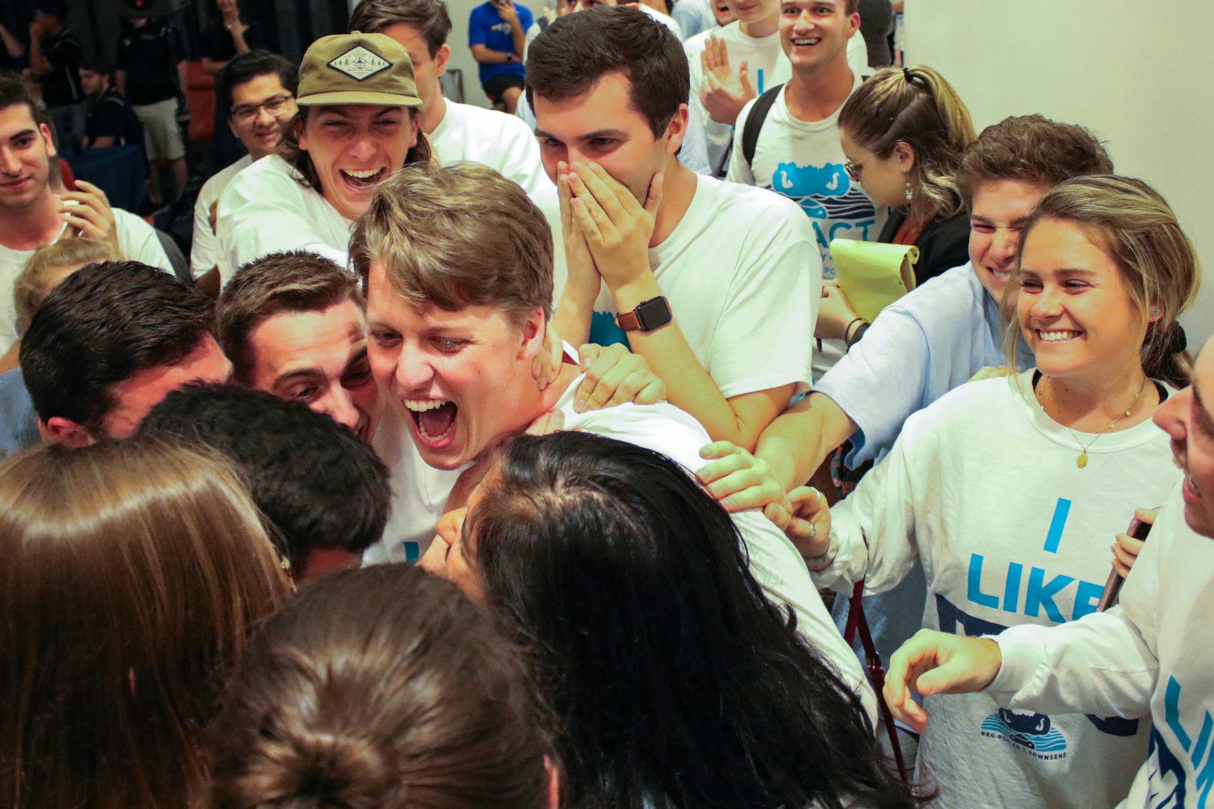 Michael Murphy, the 21-year-old Impact Party presidential candidate, celebrates winning the Student Government executive election Wednesday in the Reitz Union. He defeated Zachariah Chou, the 21-year-old Inspire candidate, 6,331 votes to 4,196. "I just can't wait to sit down for a little bit and just take it all in," Murphy said.
&nbsp;