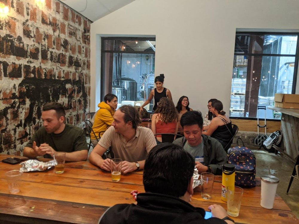 <p>Graduate assistants gather at Cypress and Grove Brewery to celebrate at a “payday party” Friday, Sept. 9, 2022.</p>